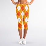 White And Orange Argyle Pattern Print Women's Capri Leggings