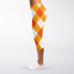 White And Orange Argyle Pattern Print Women's Capri Leggings