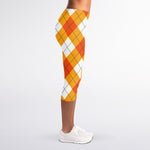 White And Orange Argyle Pattern Print Women's Capri Leggings