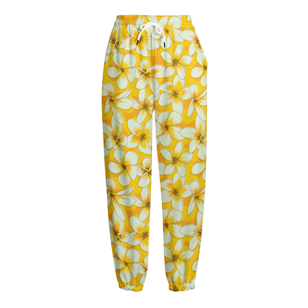 White And Yellow Plumeria Pattern Print Fleece Lined Knit Pants