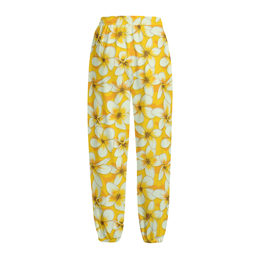 White And Yellow Plumeria Pattern Print Fleece Lined Knit Pants