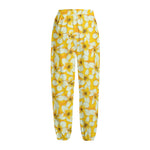 White And Yellow Plumeria Pattern Print Fleece Lined Knit Pants