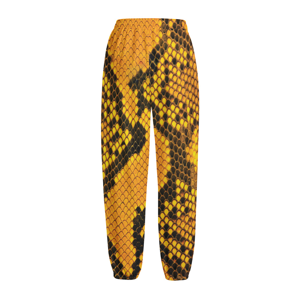 Yellow And Black Snakeskin Print Fleece Lined Knit Pants