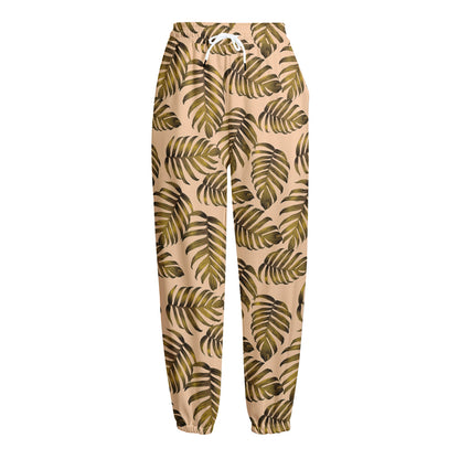 Yellow Monstera Leaves Pattern Print Fleece Lined Knit Pants