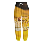 Yellow Python Snake Print Fleece Lined Knit Pants