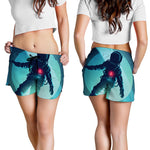 Astronaut Floating Through Space Print Women's Shorts