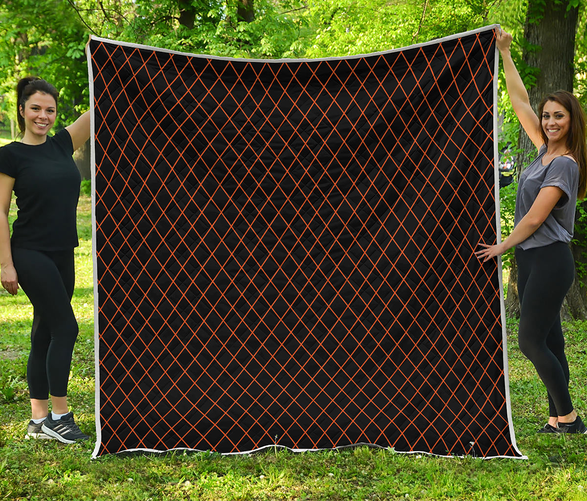 Black And Orange Harlequin Print Quilt