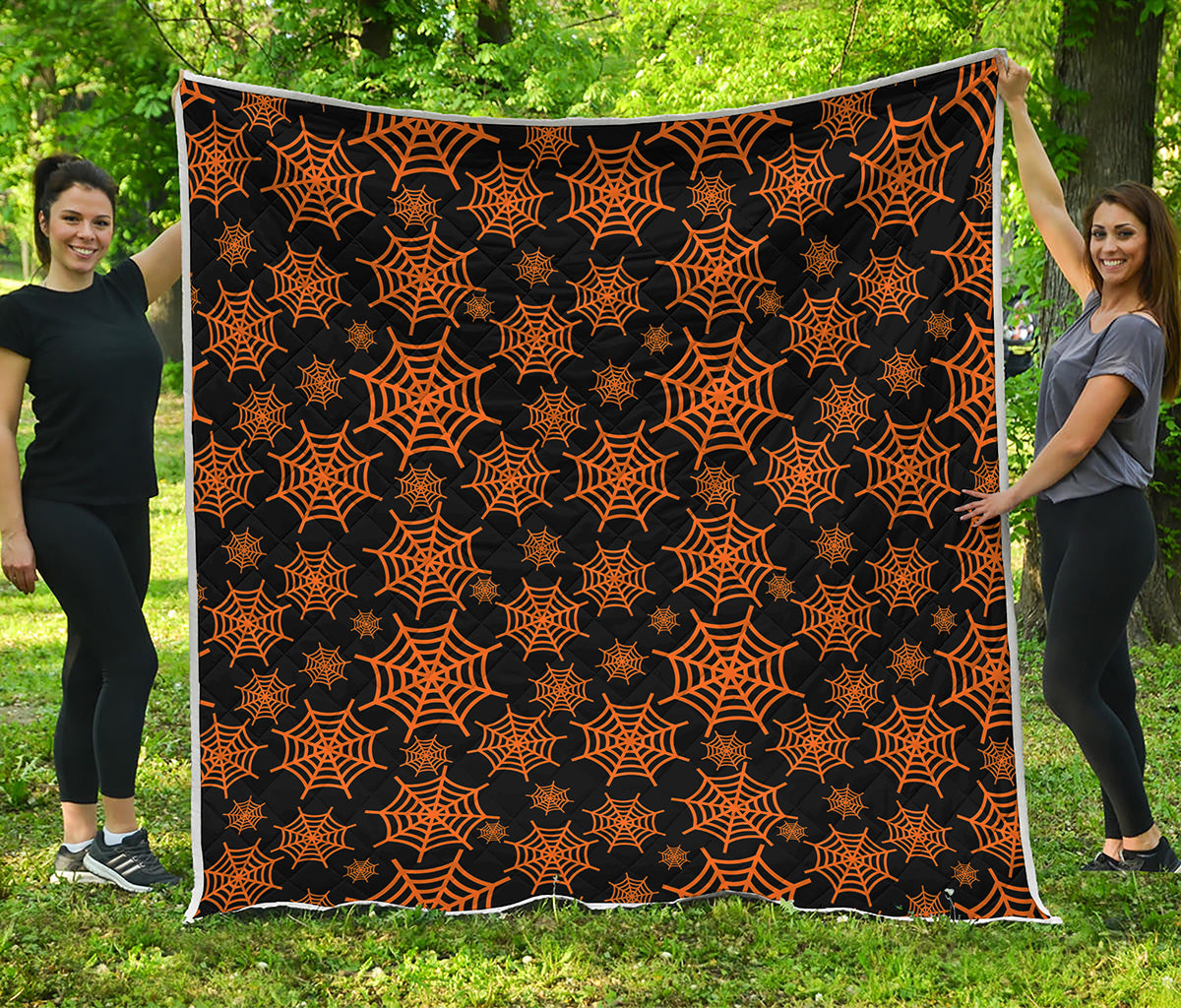 Black And Orange Spider Web Print Quilt