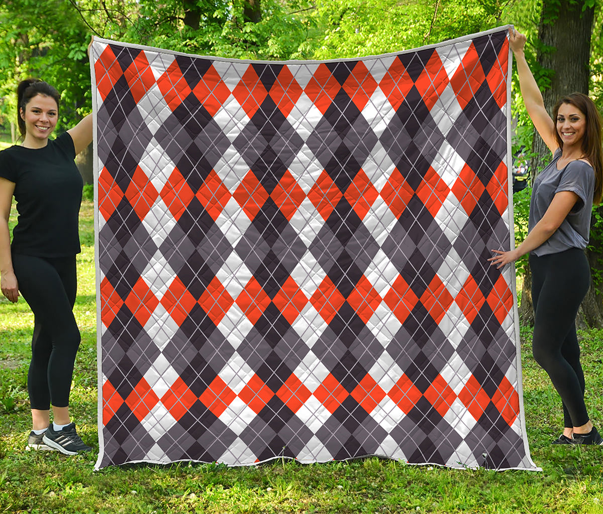 Grey Black Orange And White Argyle Print Quilt