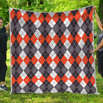 Grey Black Orange And White Argyle Print Quilt