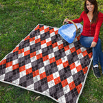 Grey Black Orange And White Argyle Print Quilt