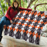 Grey Black Orange And White Argyle Print Quilt