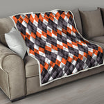 Grey Black Orange And White Argyle Print Quilt