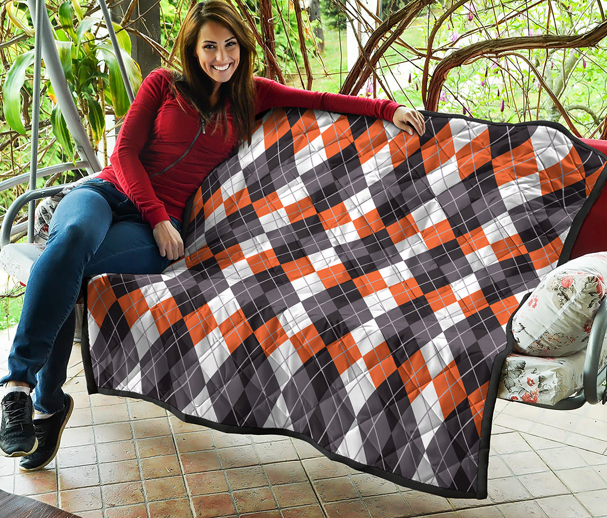 Grey Black Orange And White Argyle Print Quilt