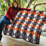 Grey Black Orange And White Argyle Print Quilt