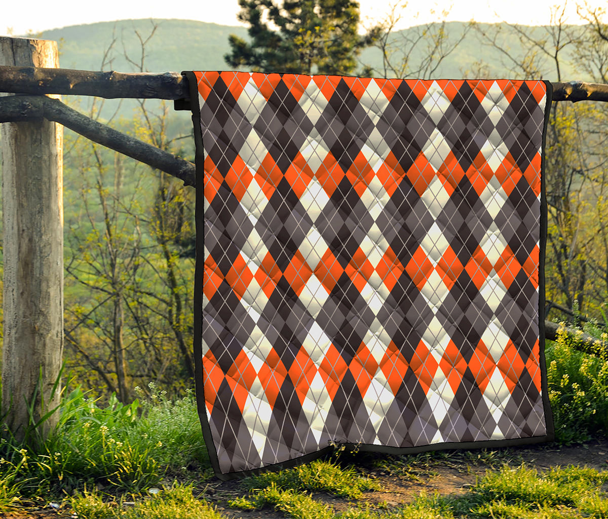 Grey Black Orange And White Argyle Print Quilt