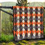 Grey Black Orange And White Argyle Print Quilt