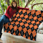 Orange And Black Argyle Print Quilt
