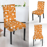Orange Paw And Bone Pattern Print Dining Chair Slipcover