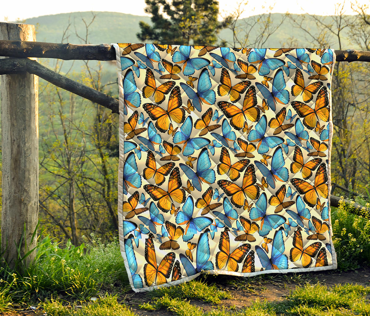 Turquoise And Orange Butterfly Print Quilt