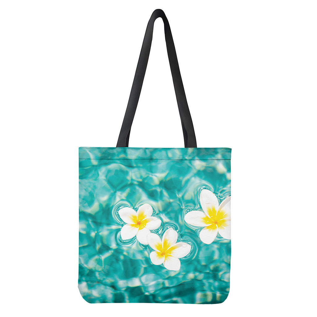 White And Yellow Plumeria In Water Print Tote Bag
