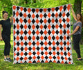 White Black And Orange Harlequin Print Quilt
