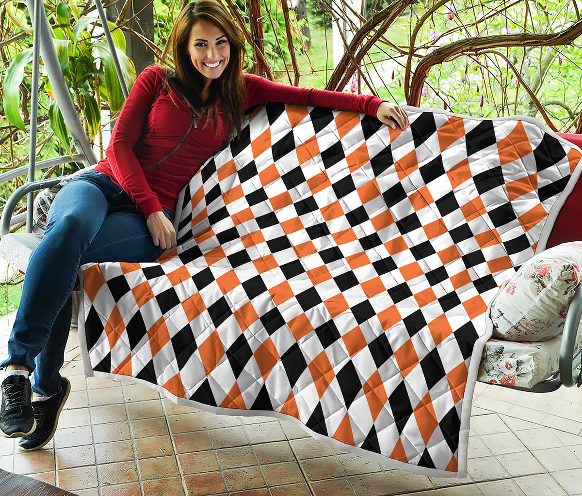 White Black And Orange Harlequin Print Quilt