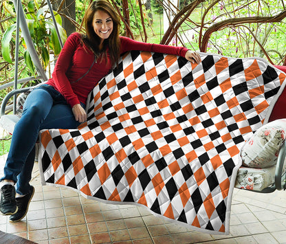 White Black And Orange Harlequin Print Quilt