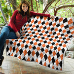 White Black And Orange Harlequin Print Quilt