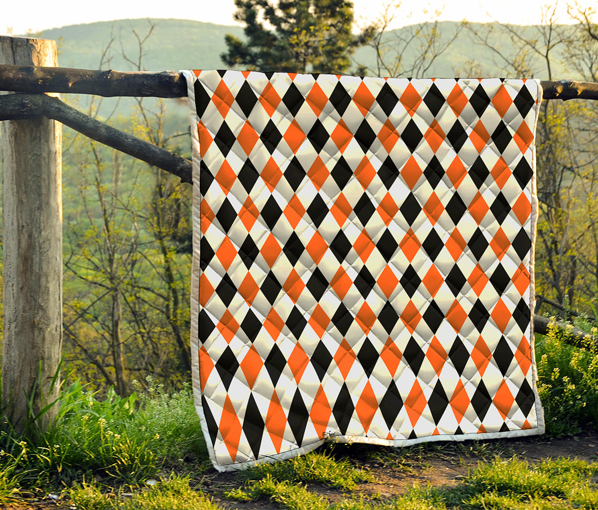 White Black And Orange Harlequin Print Quilt