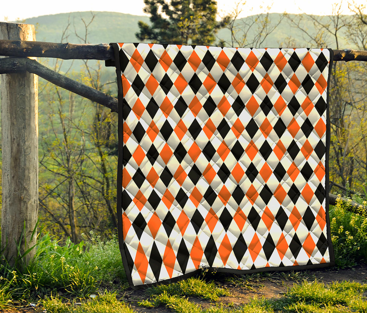 White Black And Orange Harlequin Print Quilt