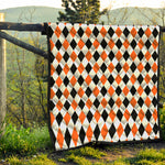 White Black And Orange Harlequin Print Quilt