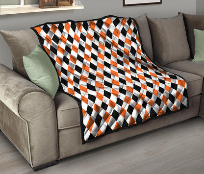 White Black And Orange Harlequin Print Quilt